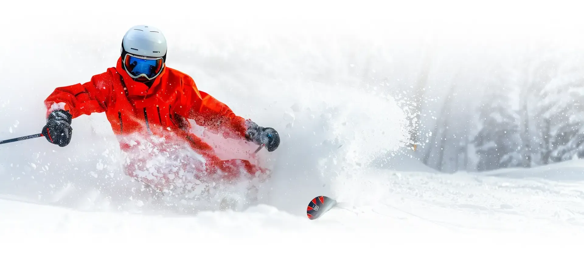 Narciarz w głębokim puchu śnieżnym